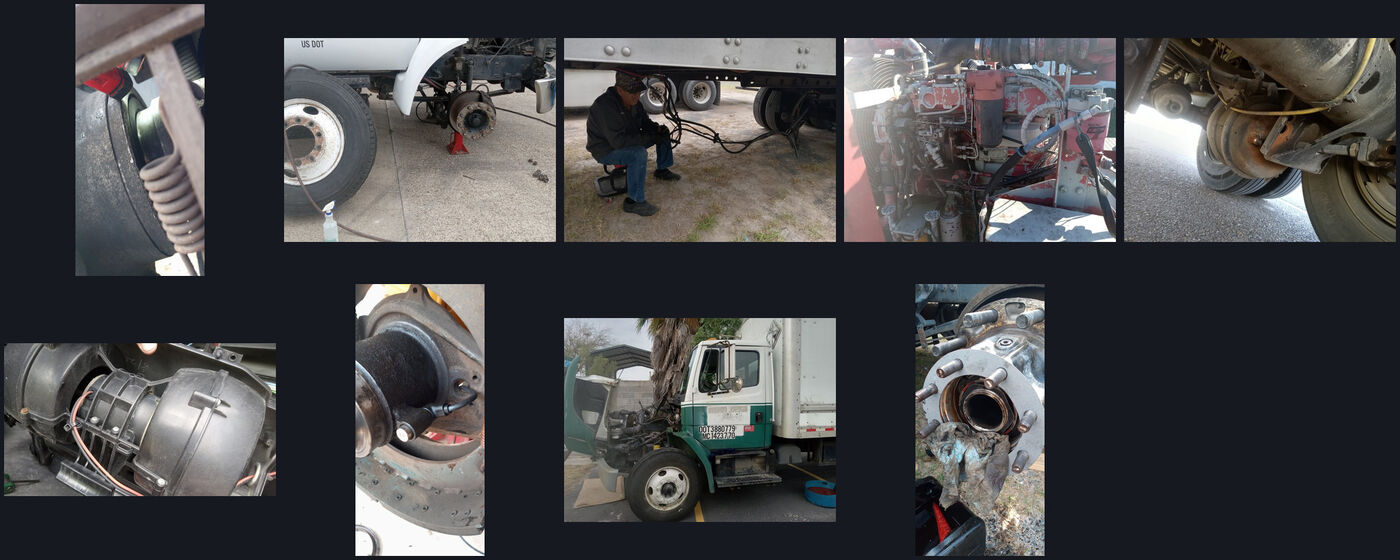 Peterbilt tractor with the hood open while a technician works on the engine